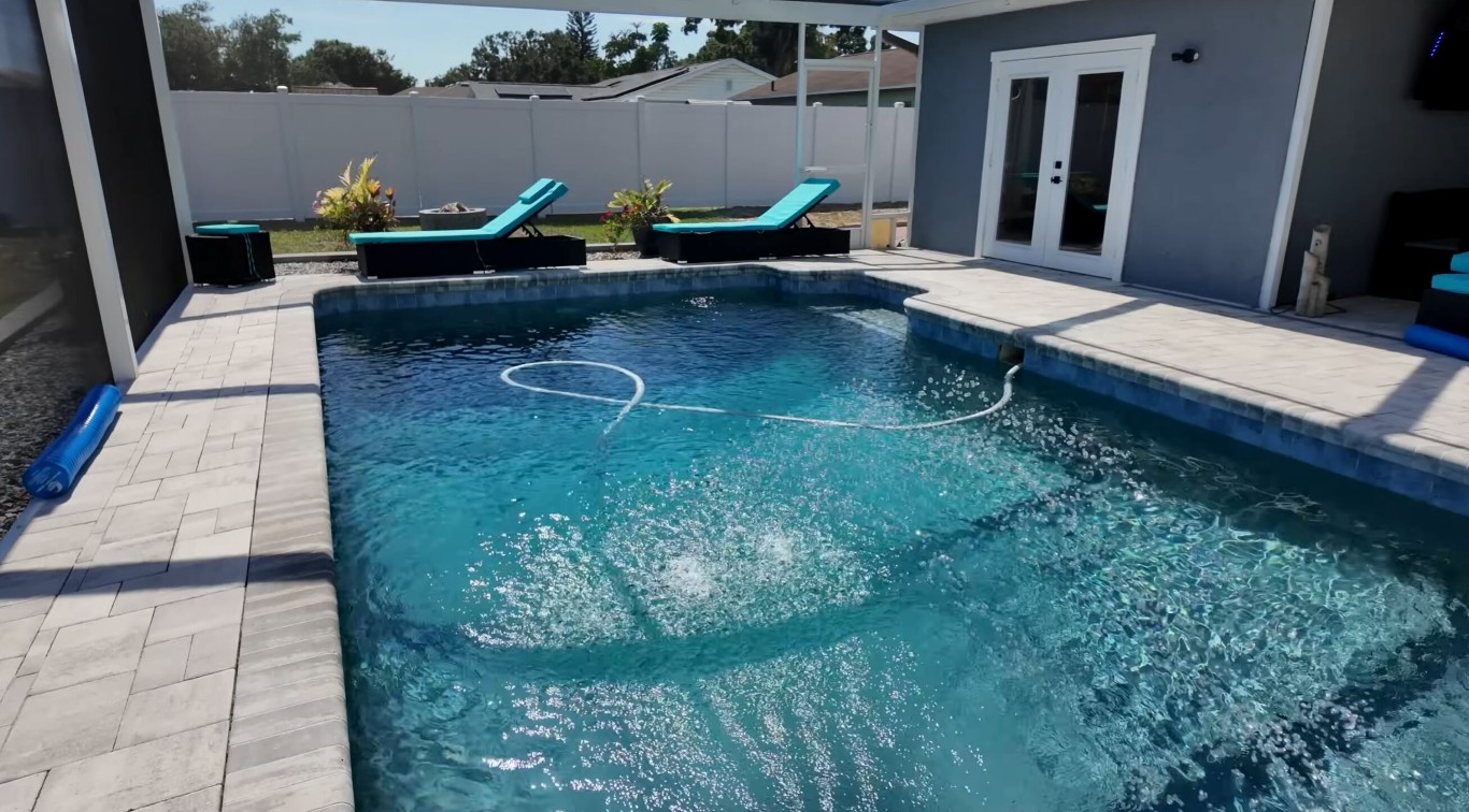 Clean residential swimming pool with crystal clear water in Leesburg, FL